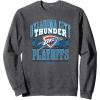 imageNBA Official Oklahoma City Thunder 2025 Playoffs Showtime SweatshirtDark Heather Grey