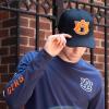 imageUltra Game NCAA Official All Around The World Trucker HatBlack